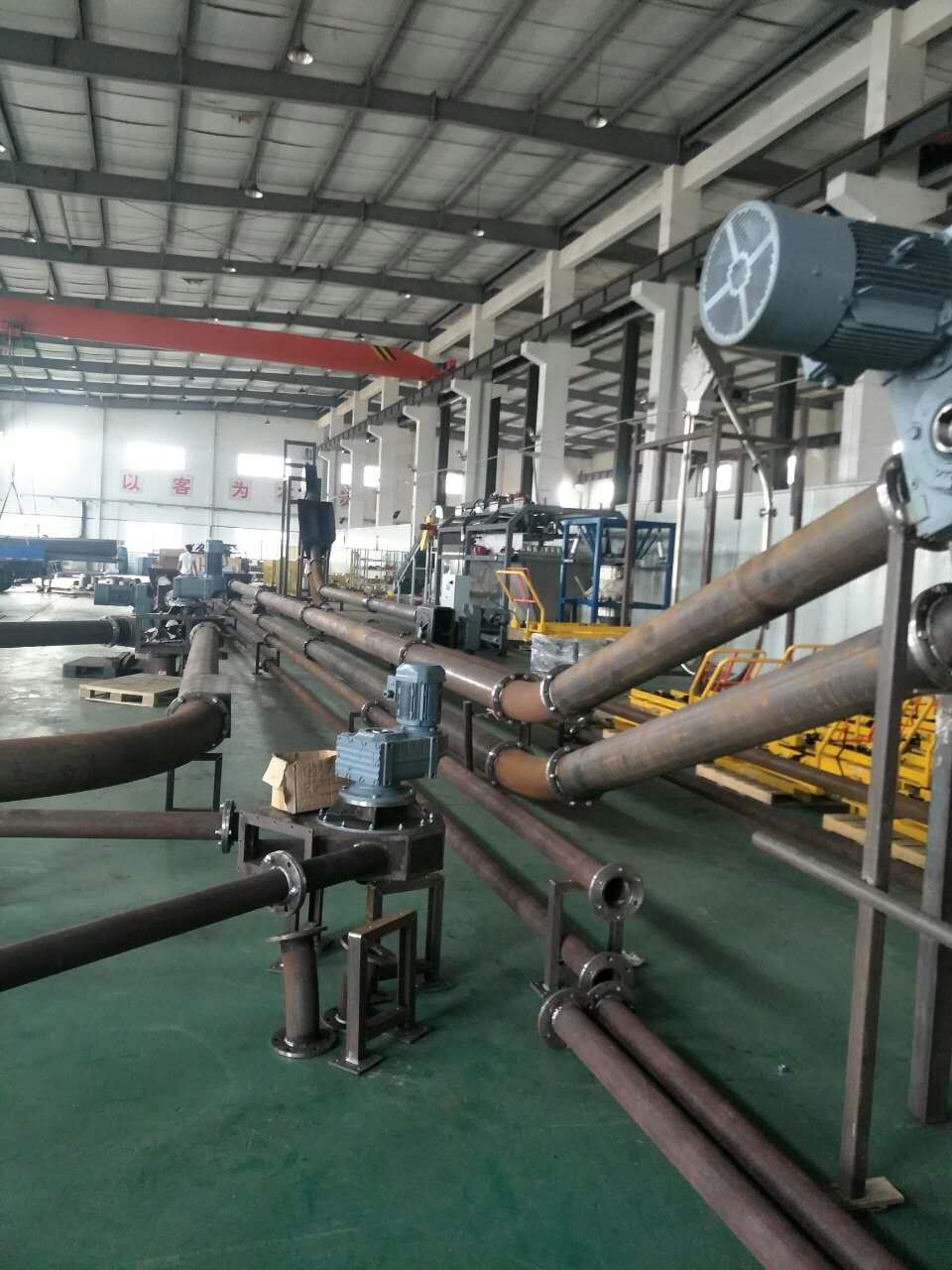 管链输送机生产车间装配调试_渊驰粉粒体技术(上海)有限公司